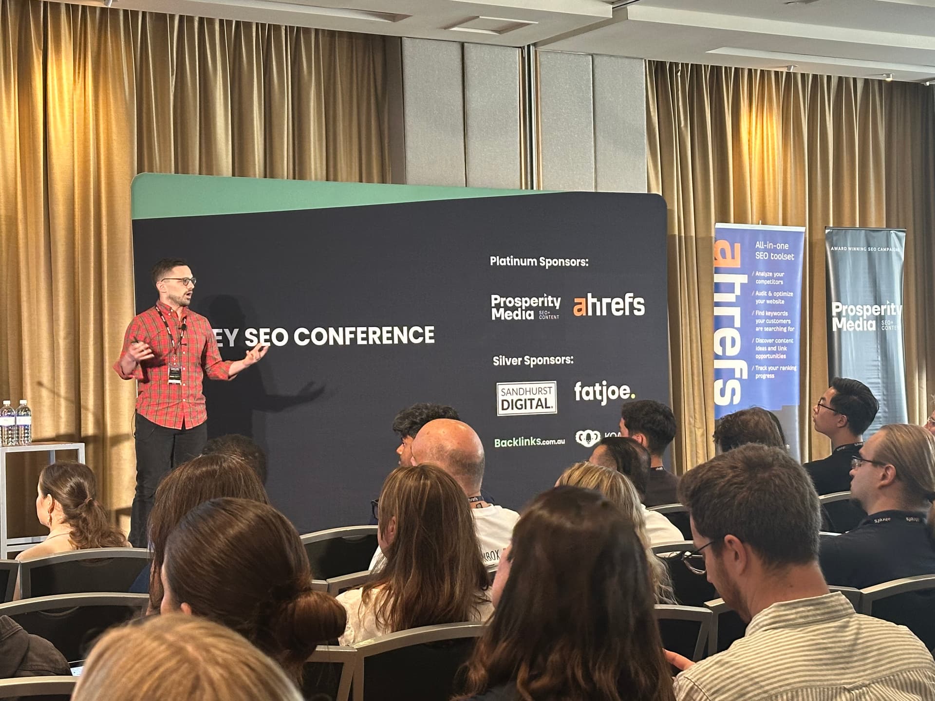 Shane Dutka speaking at an SEO conference